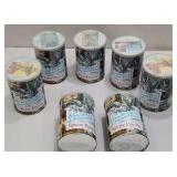 7 jigsaw puzzles in the original tins - Great