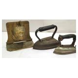 2 sad irons and bulldog door stop