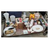 Cart #24 bottom row includes cast iron swan door