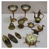 Box of brass figurines and barometer