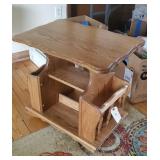 Oak magazine end stand on rollers