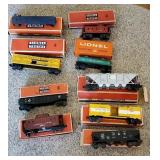 9 Lionel train cars with original boxes