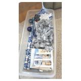 Long plastic tub of Christmas include lots of