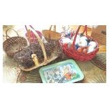 Pile of baskets and tin kitty cat tray