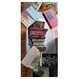 Large plastic tub of miscellaneous books