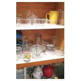 2 ½ shelves and cupboard of kitchenware