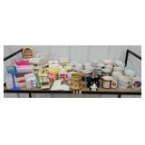 Cart 33 - top row coffee mugs and Barbie