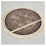 Round Oriental type throw rug