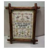A true friend sampler in vintage Eastlake frame