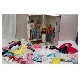 Group of Barbies and Kens with accessories