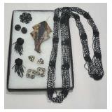 Tray mostly black jewelry