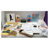 Piled full box of train-related ephemera and