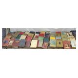 Large group of old books including Uncle Tom