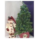 Artificial Christmas tree and snowman