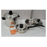 Set of three heavy stainless steel pans