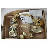 Box of door hardware with keys and locks