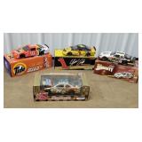 4 NASCAR diecast cars including Ricky rudd, Dale