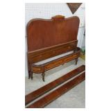 Curved footboard bed