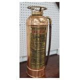 Copper and brass fire extinguisher 
Backside on
