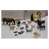Box of horses and wooden carved zebra