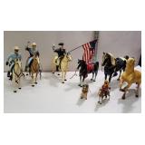 Group of horses and dog