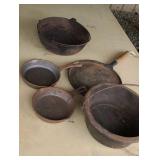 Group of cast iron pans