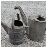 2 watering cans