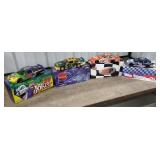 4 NASCAR diecast cars including Mike Skinner,