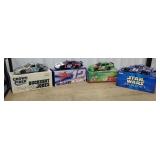 Bottom row cart 55 - 4 NASCAR diecast cars