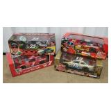 Bottom row of cart 21 - 4 NASCAR diecast cars