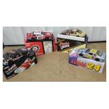 Bottom row of cart 21 - 4 NASCAR diecast cars