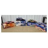 Bottom row of cart 21 - 4 NASCAR diecast cars