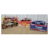 top row of cart 21 - 4 NASCAR diecast cars