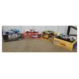 Top row of cart 21 - 4 NASCAR diecast cars