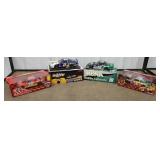 Bottom row of cart 22 - 4 NASCAR diecast cars