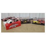 Top row of cart 21 - 4 NASCAR diecast cars