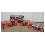 Bottom row of cart 22 - 4 NASCAR diecast cars