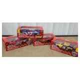 Bottom row of cart 22 - 4 NASCAR diecast cars