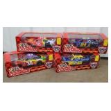 Top row of cart 22 - 4 NASCAR diecast cars