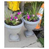2 plastic flower pots with flowers