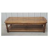 Coffee table with rattan bottom shelf