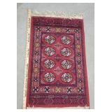 Small Oriental throw rug