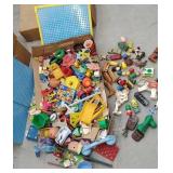 Large box of miscellaneous toys parts and pieces