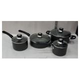 Set of four heavy non-stick "cooks" pans