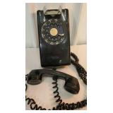 Black wall phone - it was still hooked up and
