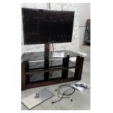 Samsung 46" flat screen TV with glass top base