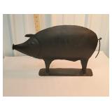 Metal sculptured pig statue