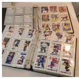 2 sports card albums - football and hockey
