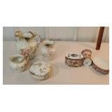 2 sets - pitchers, soap dishes, etc...