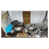 Cart 35a - Bottom row of mostly cookware